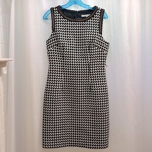 TRINA TURK black and cream with metal detail edging missing original belt size 6